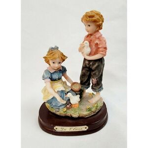 Vintage De Elina "boy and girl feeding ducks" Resin statue figurine